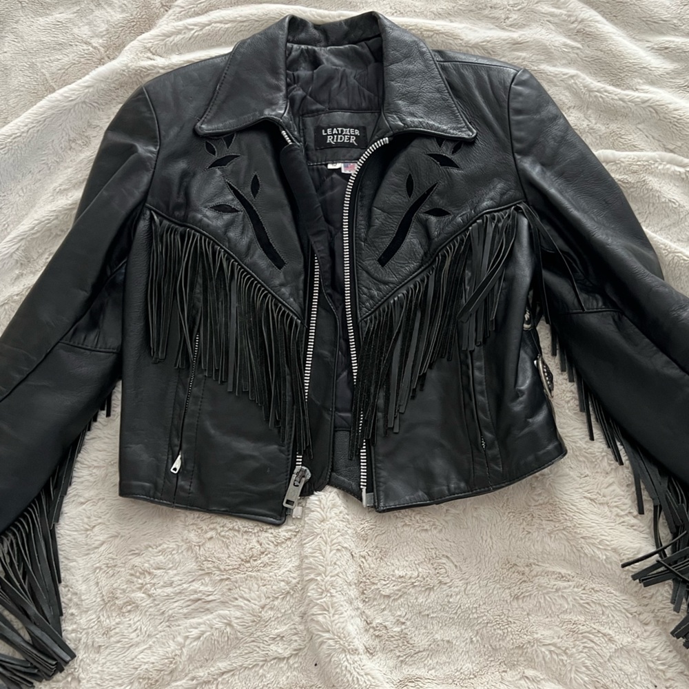 Vintage real leather fringe biker jacket.
